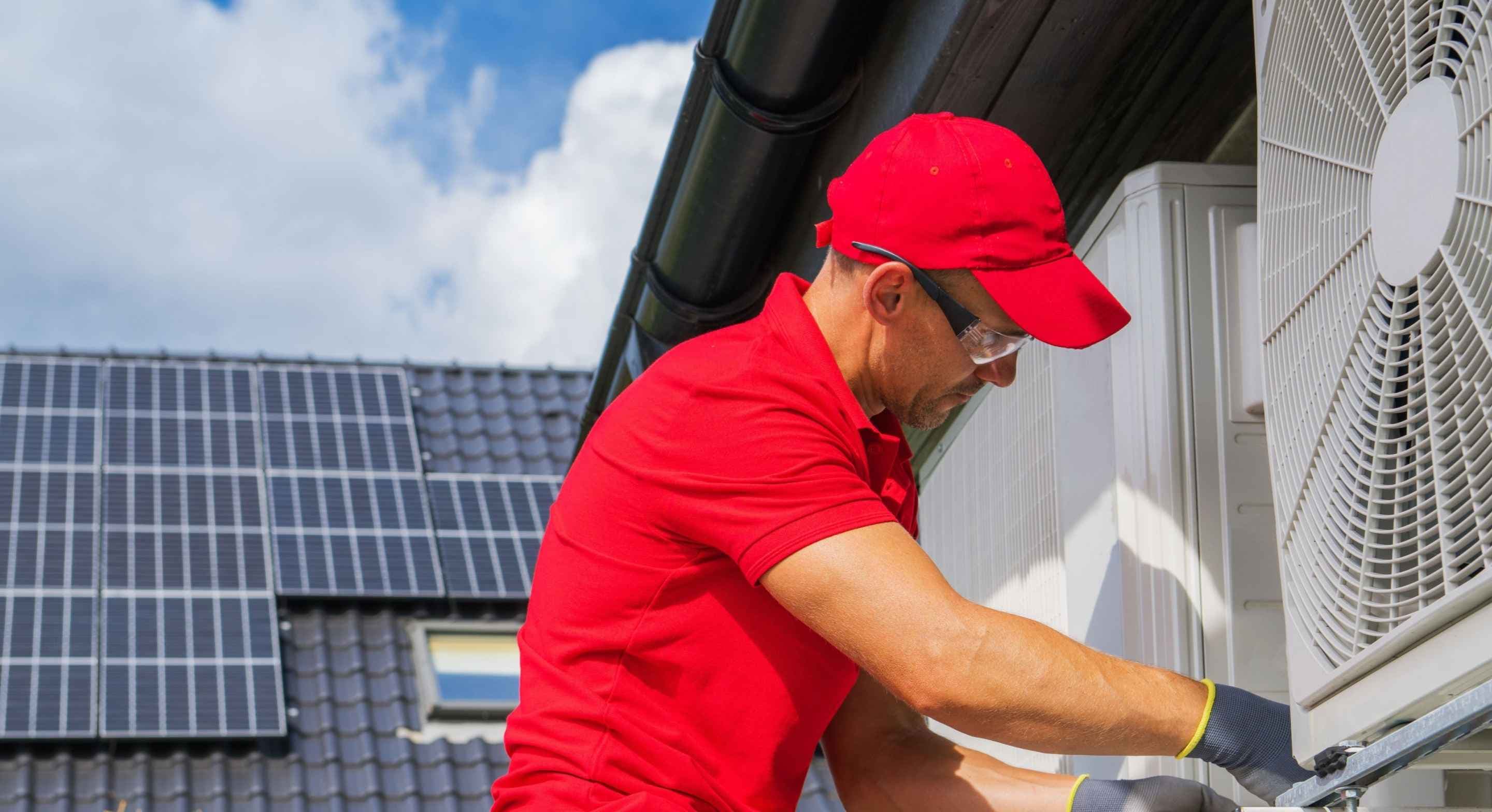 Hvac professional working on site | ServiceForge