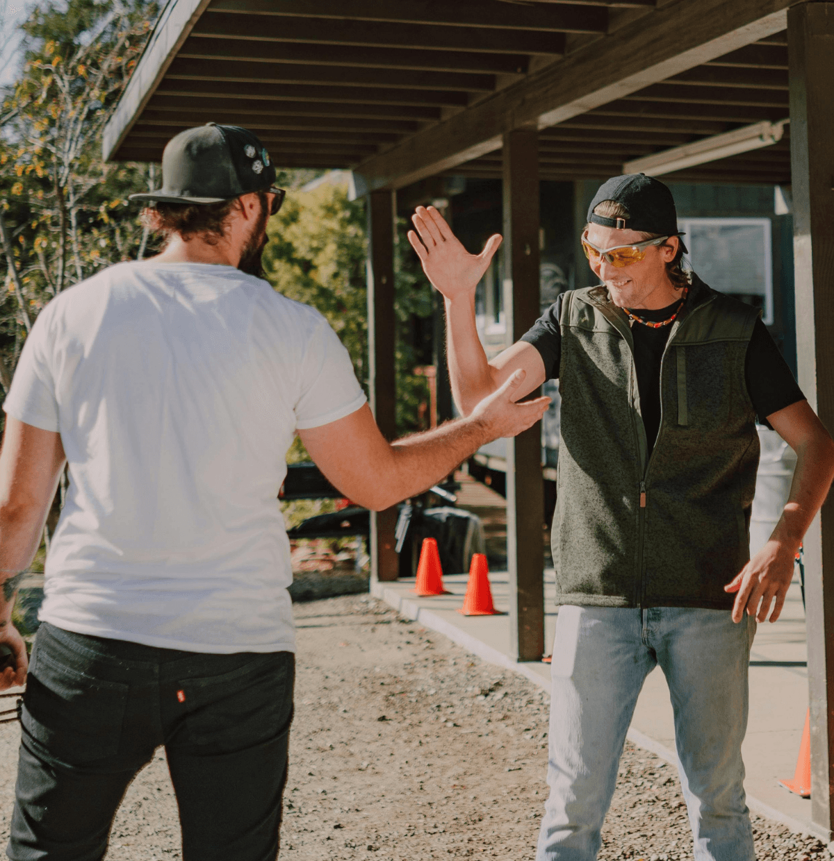 Two contractors high fiving