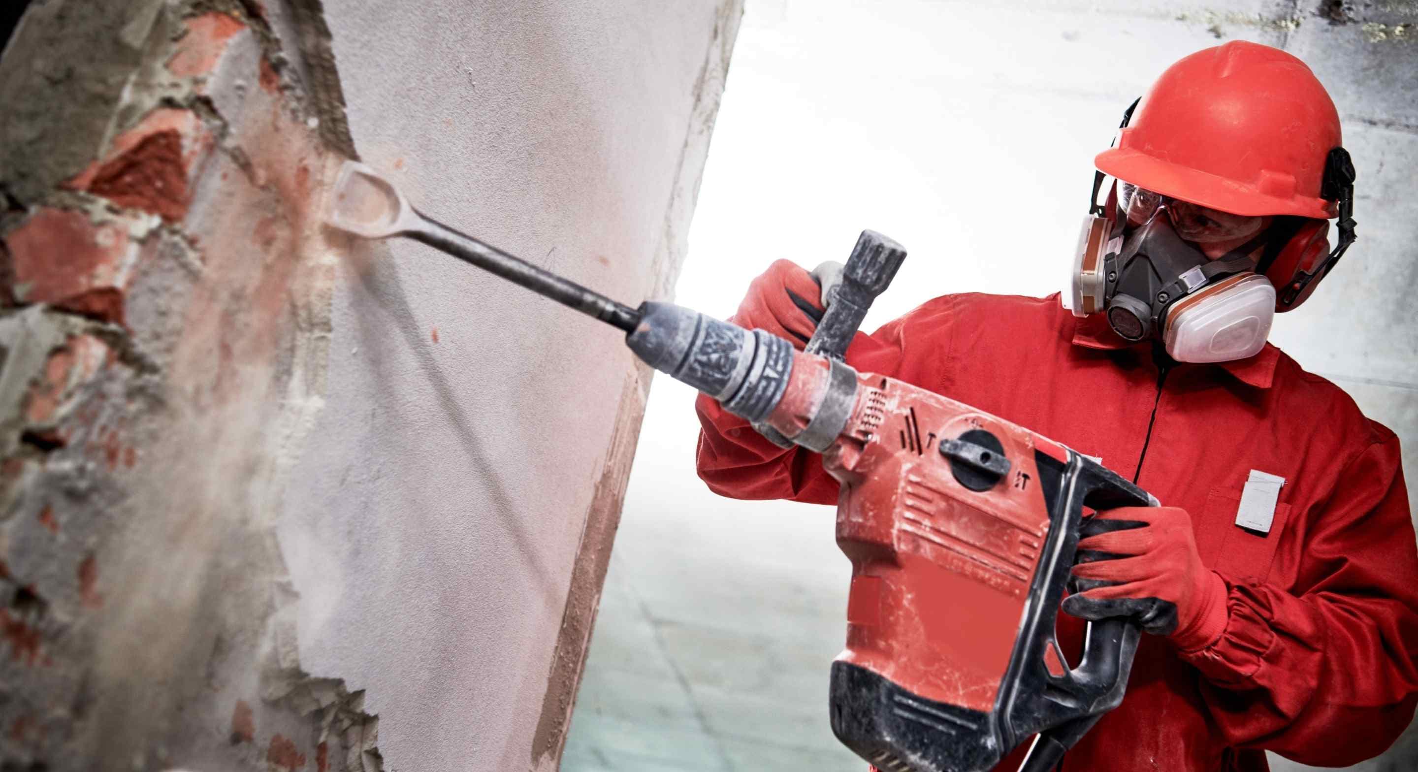 remodeller drilling the project house