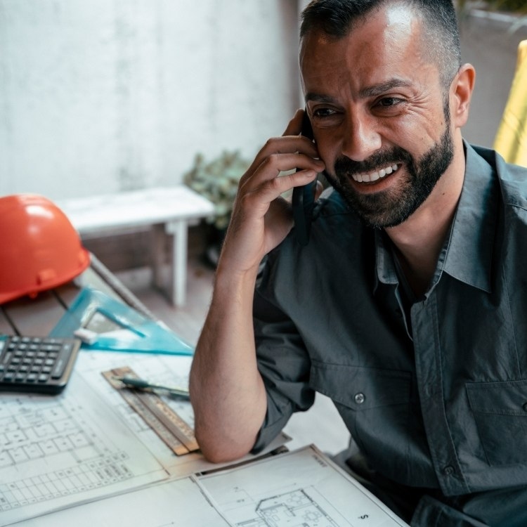 home service professional speaking in phone